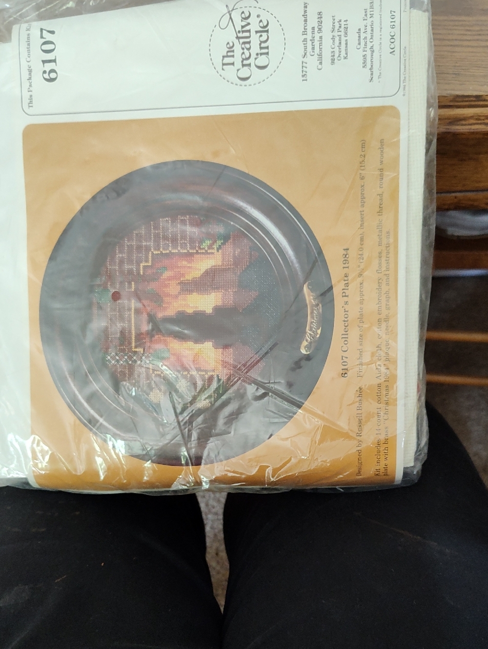 Black Decorative Collector Plate with Sunset Cross-Stitch Design